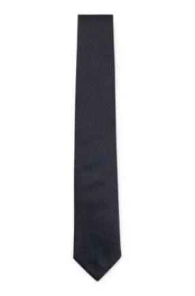 Corbata de seda con monogramas tejidos en jacquard