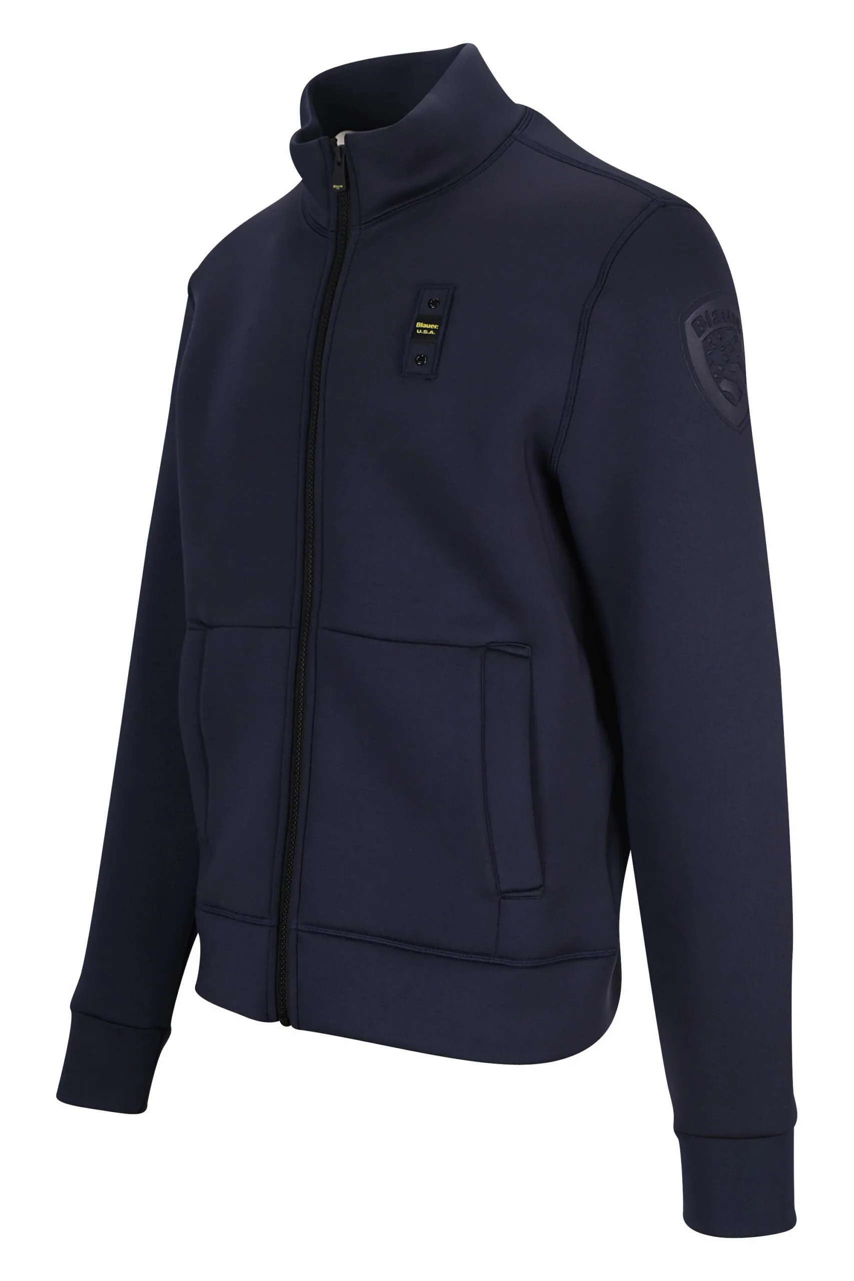 Sudadera azul con cremallera y logo parche monocromático